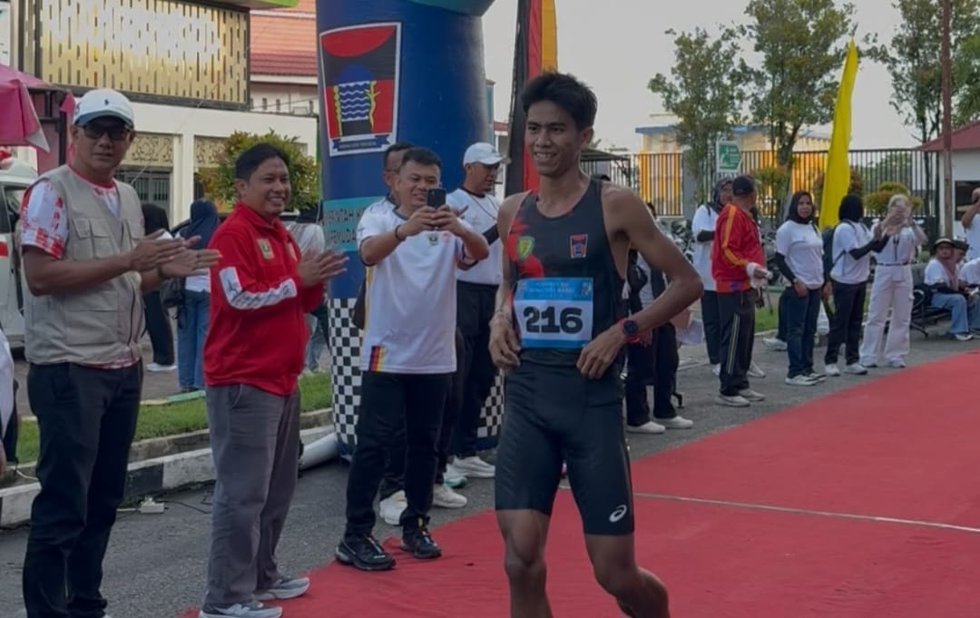 Iqbal Syaputra Raih Emas Half Marathon Porprov Sumbar, Bidik Juara Borobudur Marathon