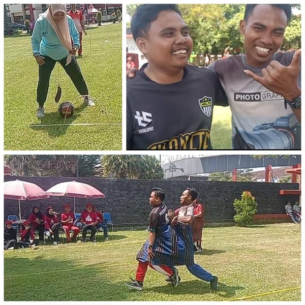 Pasangan Ari dan Cipto dari DLH Sumenep Juara I Lomba Lari Sarung Antar OPD
