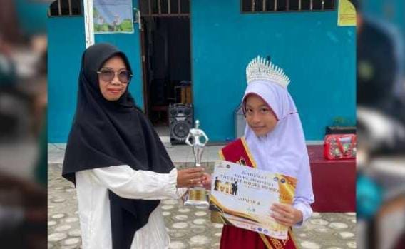Shafira Salsabilla, Siswi MI Amanah Palangka Raya Raih Juara Best Model Nasional di Jakarta