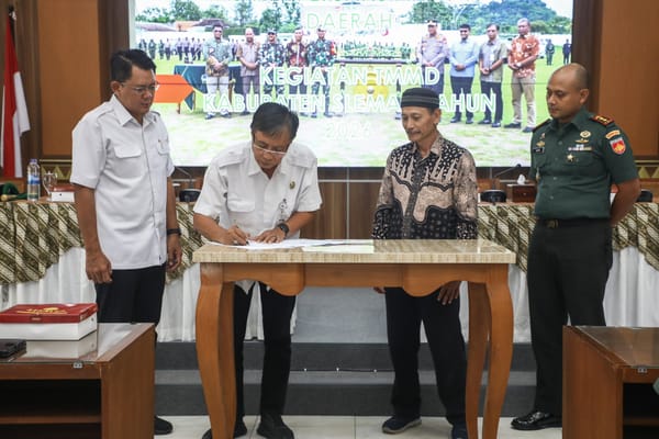 Dukung Percepatan Pembangunan Desa, Pemkab Sleman dan LPMK Teken NPHD TMMD