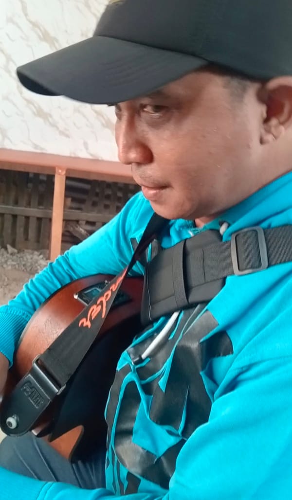 Gusti Yulian, Ketika Jalanan Menjadi Panggung dan Gitar Menjadi Teman Hidup